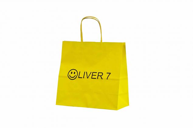 yellow paper bag with personal print 