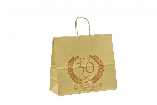 beige paper bag with print 
