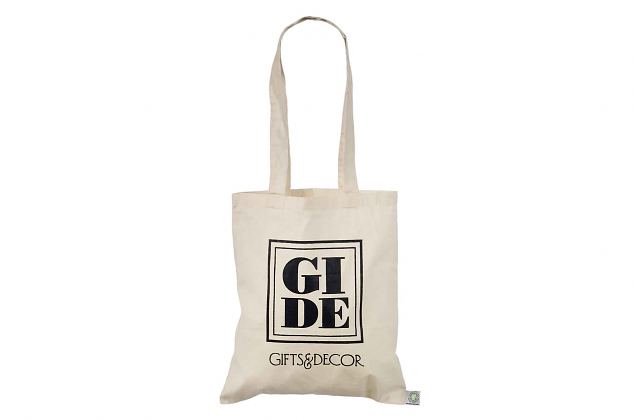 Orgaanilisest puuvillast bee�i v�rvi riidest kott. Kotil on pikad sangad. K�igile riidest kottidel