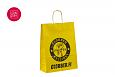 logo pealetrkiga kollased paberkotid | Fotogalerii- kollased paberkotid, millele trkitud klienti